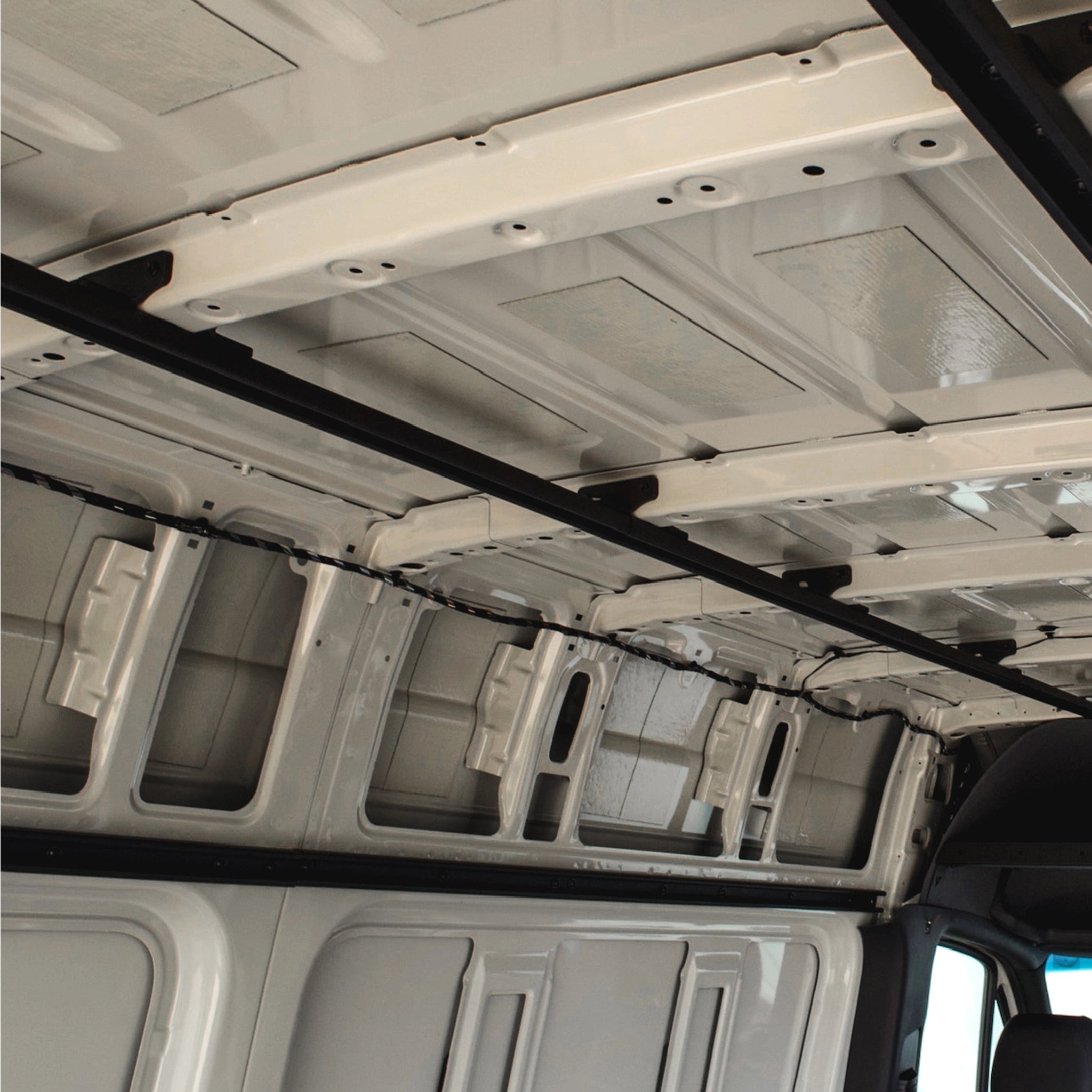 Ceiling rail system installed in Sprinter van conversion — Virtus Vans Base Camp Build