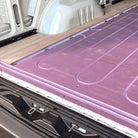Insulated marine-grade plywood flooring installed in Sprinter van — Virtus Vans Base Camp kit