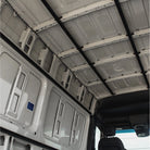 Structural wall rails installed in Mercedes Sprinter for Virtus Vans modular base camp build